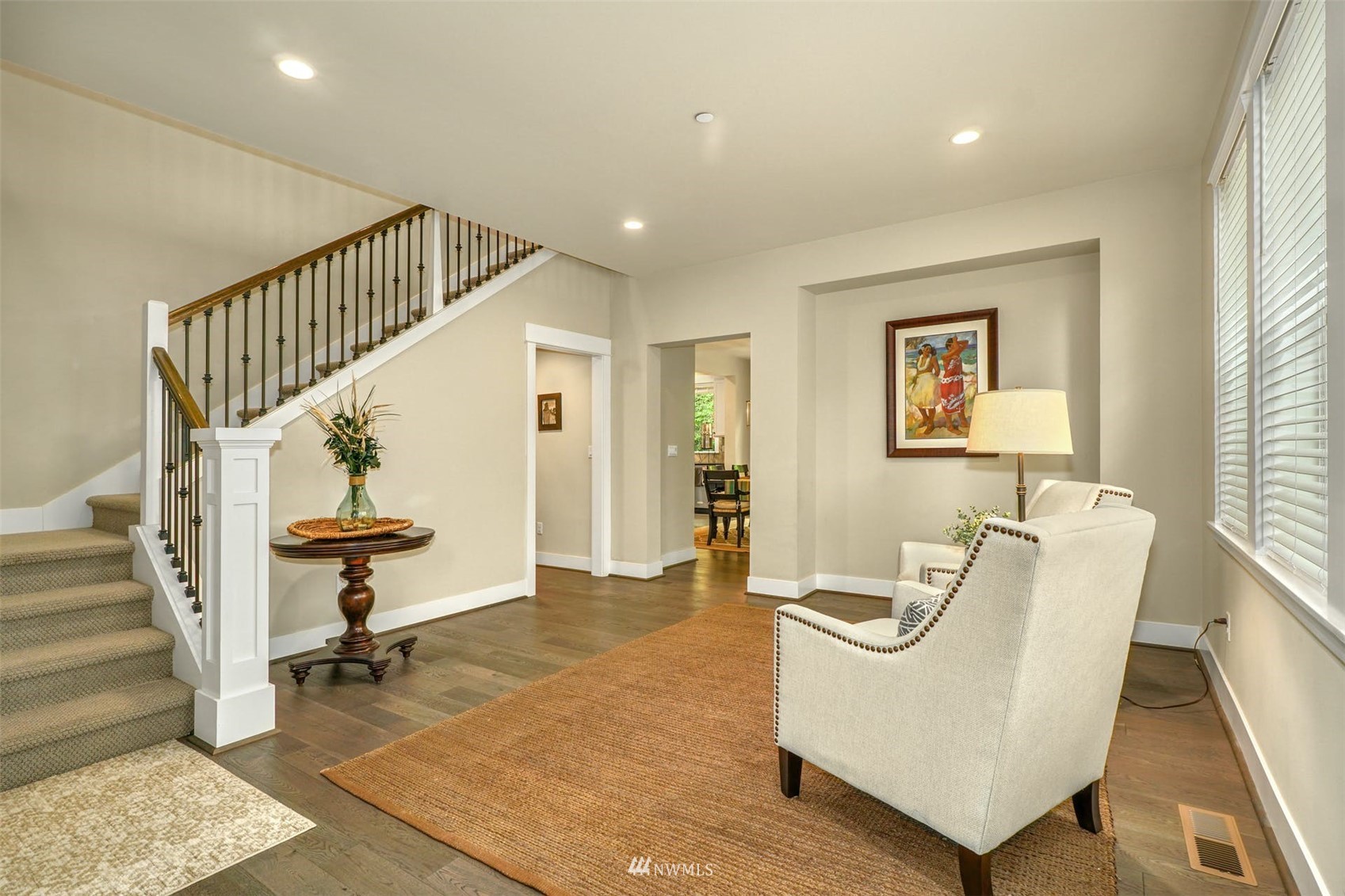 3312 238th Place Southeast Bothell, WA 98021 - Photo 5 of 40 a view of entryway and hall with wooden floor