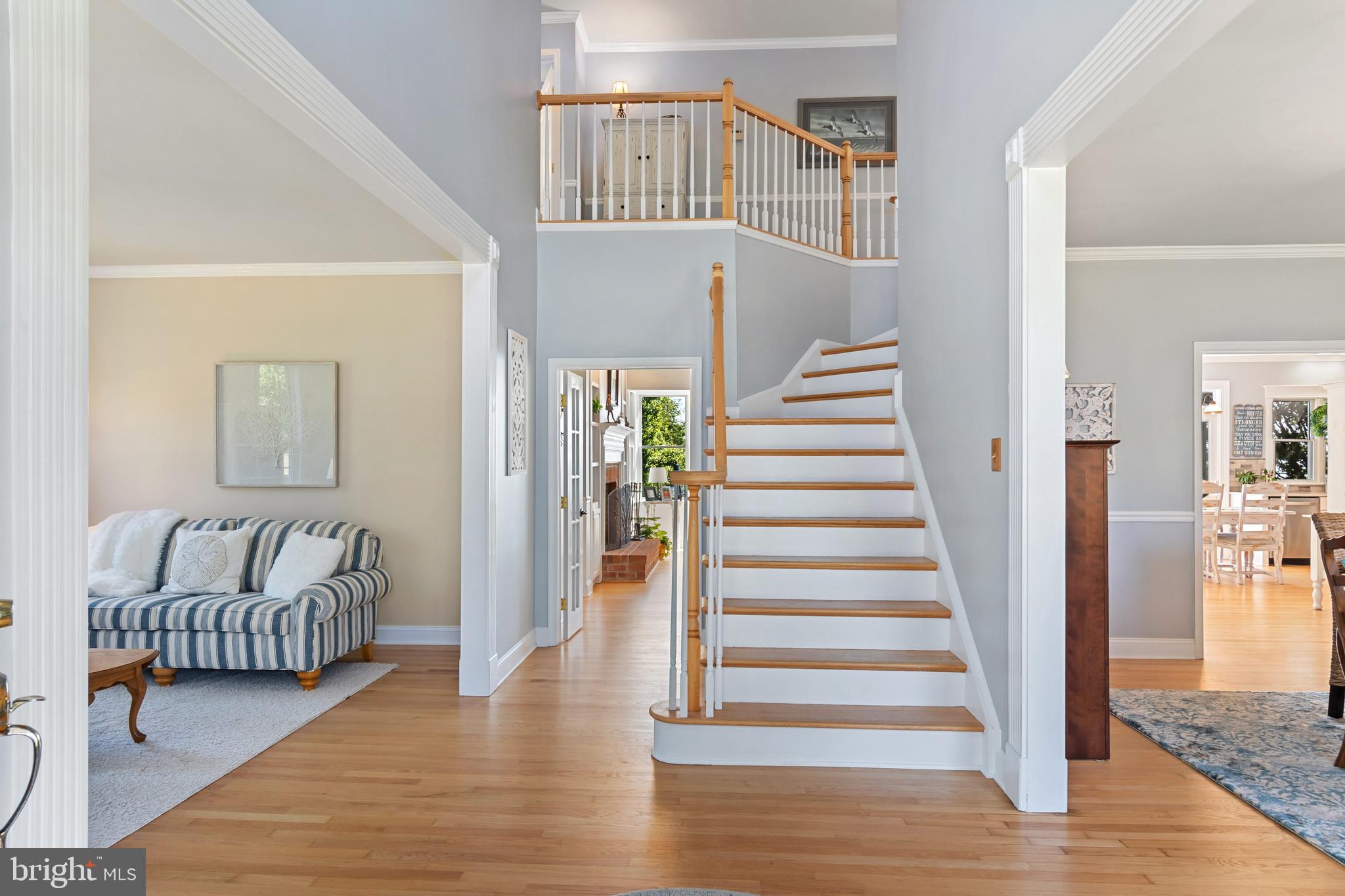 2861 Cox Neck Road Chester, MD 21619 - Photo 14 of 79 a view of entryway and hall with wooden floor