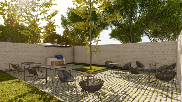 a view of a patio with table and chairs and potted plants