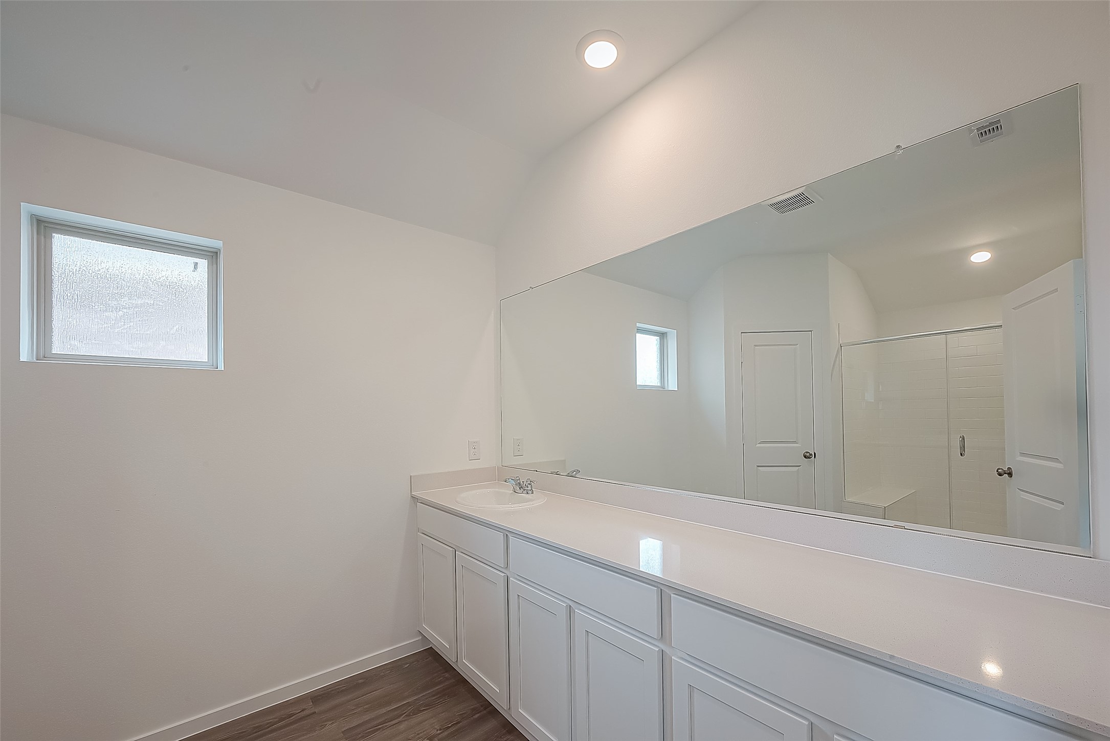 27235 Henley Rdg Drive Katy, TX 77493 - Photo 11 of 28 a bathroom with a sink and a mirror