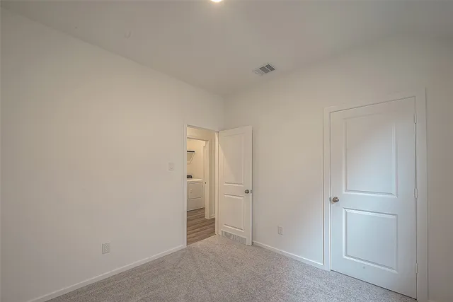 a bathroom with a sink toilet vanity and tub