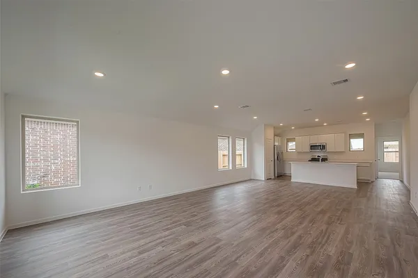 a view of kitchen and windows