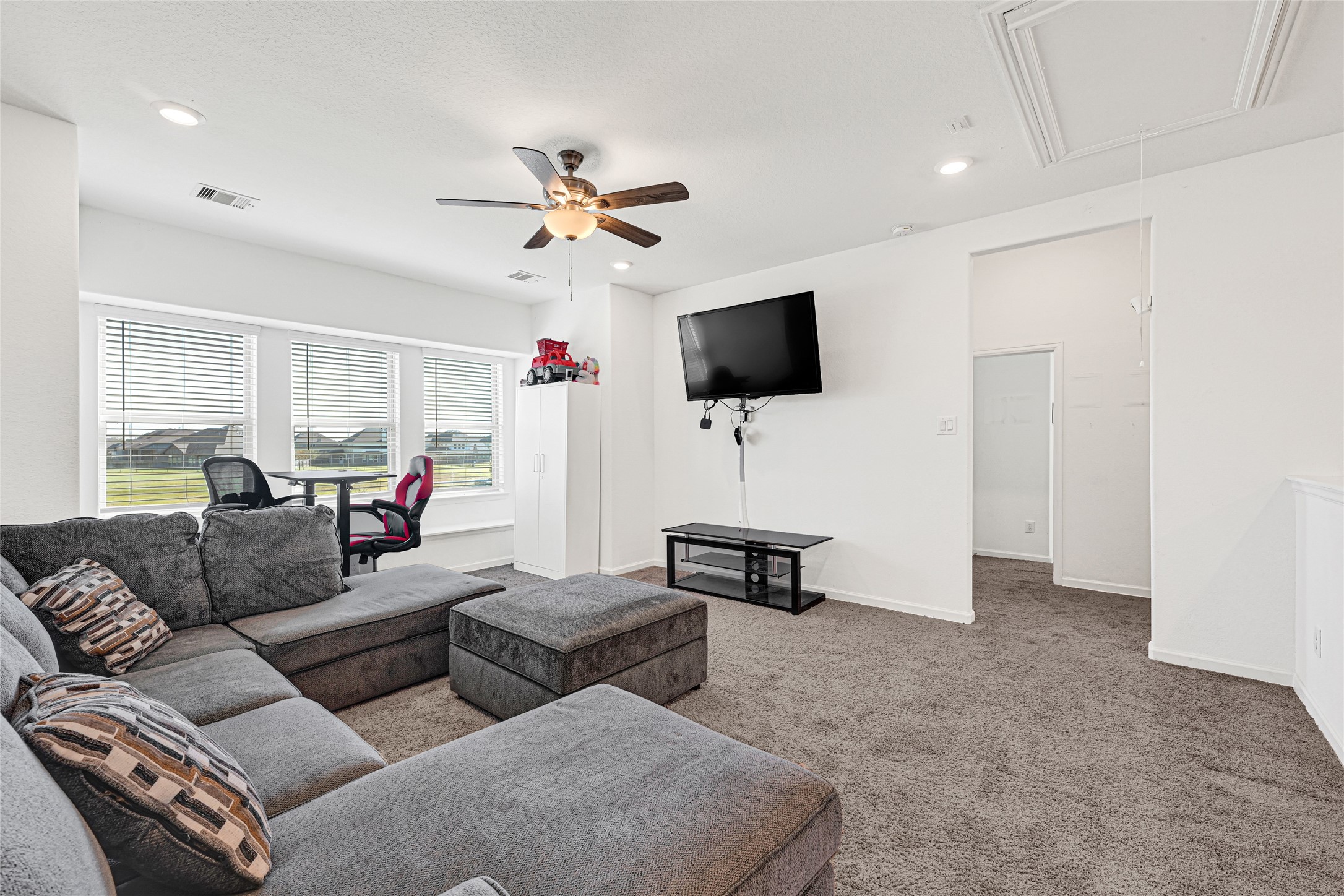 4307 Annandale Lane Rosharon, TX 77583 - Photo 14 of 31 a living room with furniture and a flat screen tv