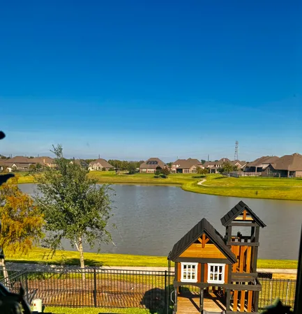 a front view of house with outdoor seating