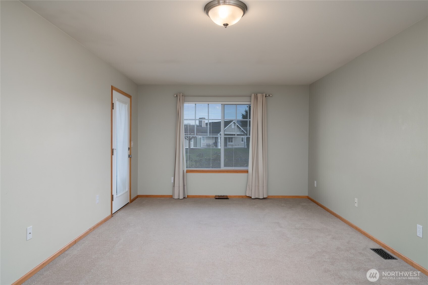 1202 Decatur Circle, Unit 20B Burlington, WA 98233 - Photo 18 of 38 an empty room with a empty space and window