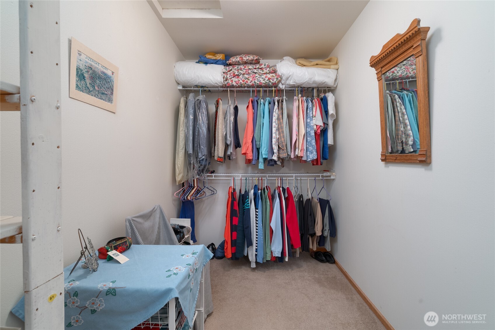 1202 Decatur Circle, Unit 20B Burlington, WA 98233 - Photo 18 of 31 a view of walk in closet with clothes