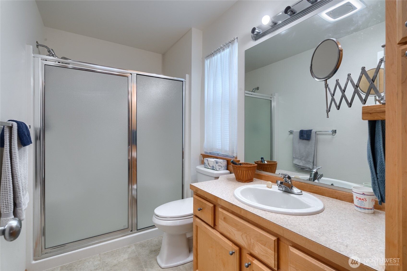 1202 Decatur Circle, Unit 20B Burlington, WA 98233 - Photo 21 of 31 a bathroom with a granite countertop sink toilet and shower