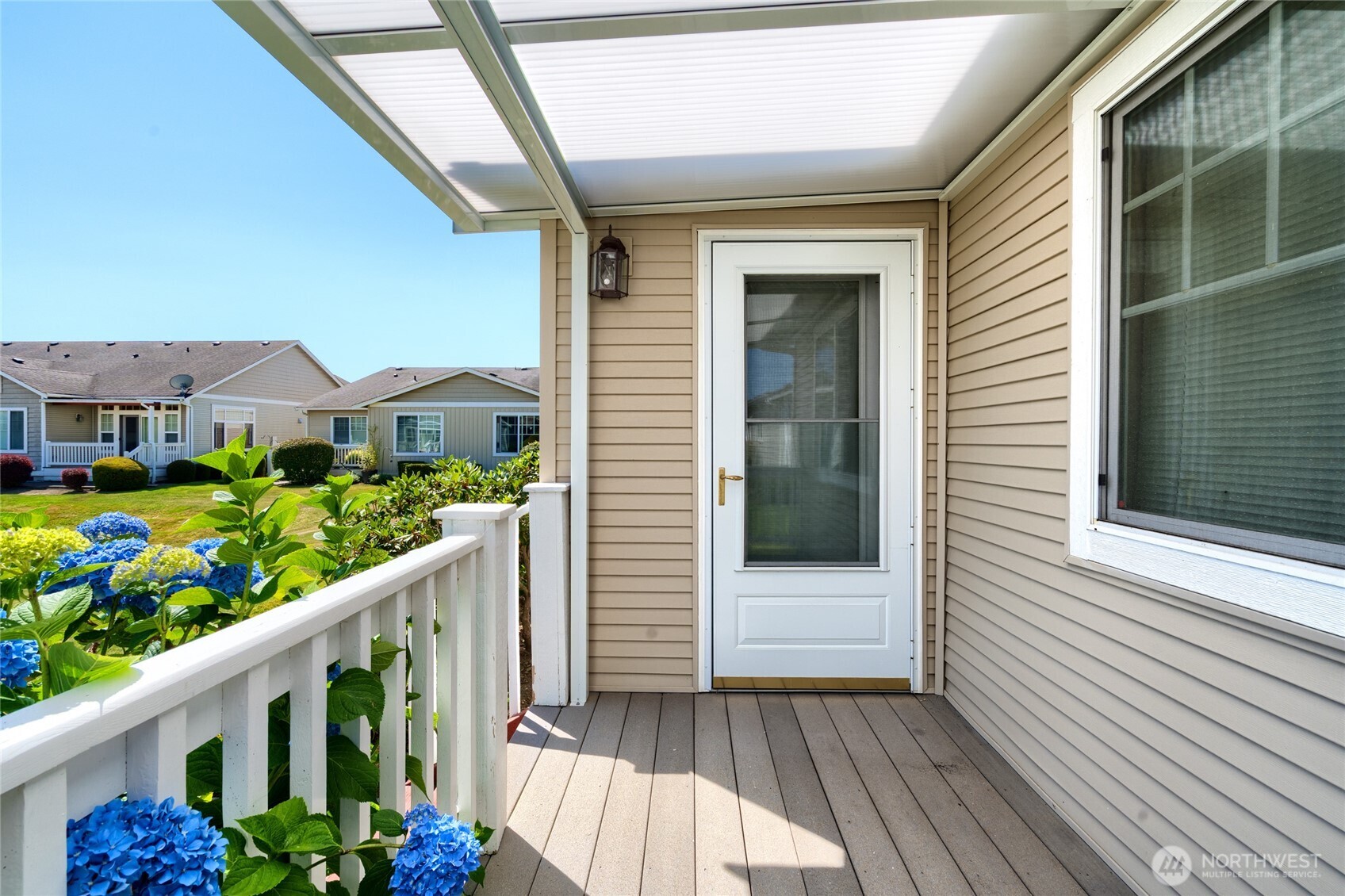 1202 Decatur Circle, Unit 20B Burlington, WA 98233 - Photo 25 of 31 a view of a balcony with wooden floor