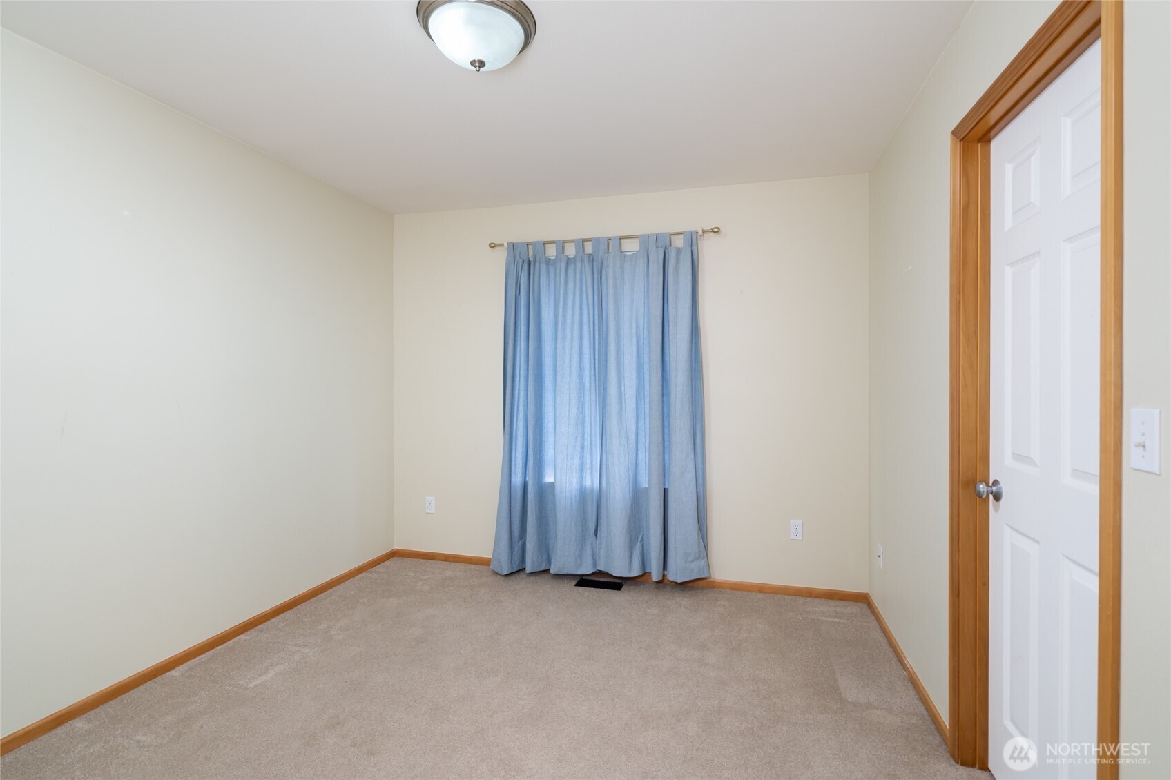 1202 Decatur Circle, Unit 20B Burlington, WA 98233 - Photo 26 of 38 a view of an empty room with wooden floor