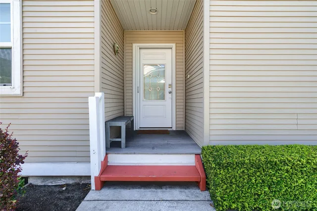 a front view of a house with a garage