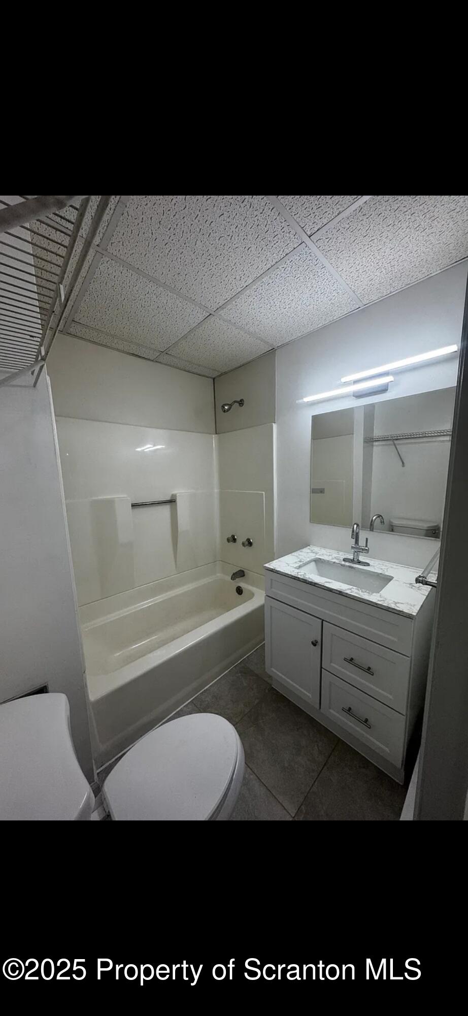 618 Gibbons Street, Unit 2 Scranton, PA 18505 - Photo 19 of 19 a bathroom with a double vanity sink and mirror