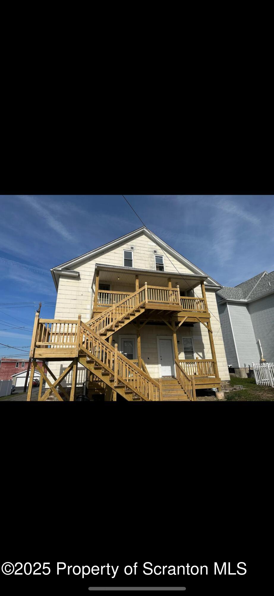 618 Gibbons Street, Unit 2 Scranton, PA 18505 - Photo 2 of 19 a view of car parked on the road