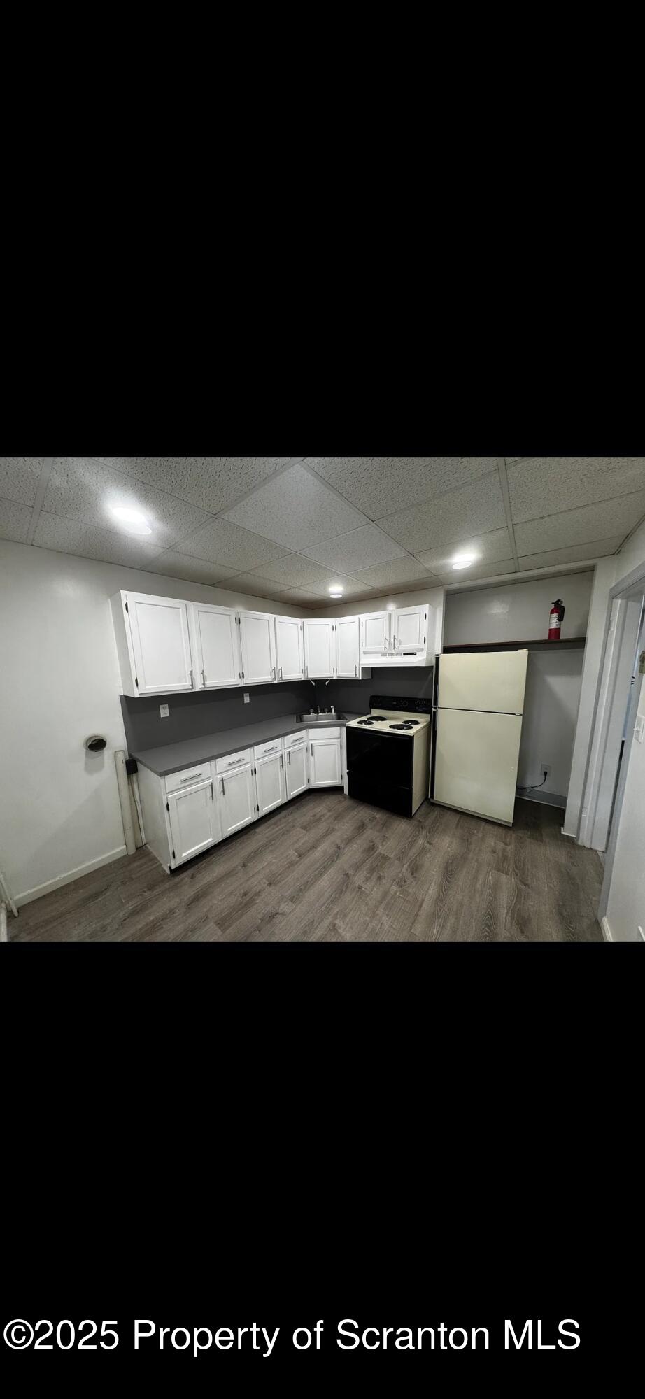 618 Gibbons Street, Unit 2 Scranton, PA 18505 - Photo 3 of 19 a view of storage and utility room with wooden floor