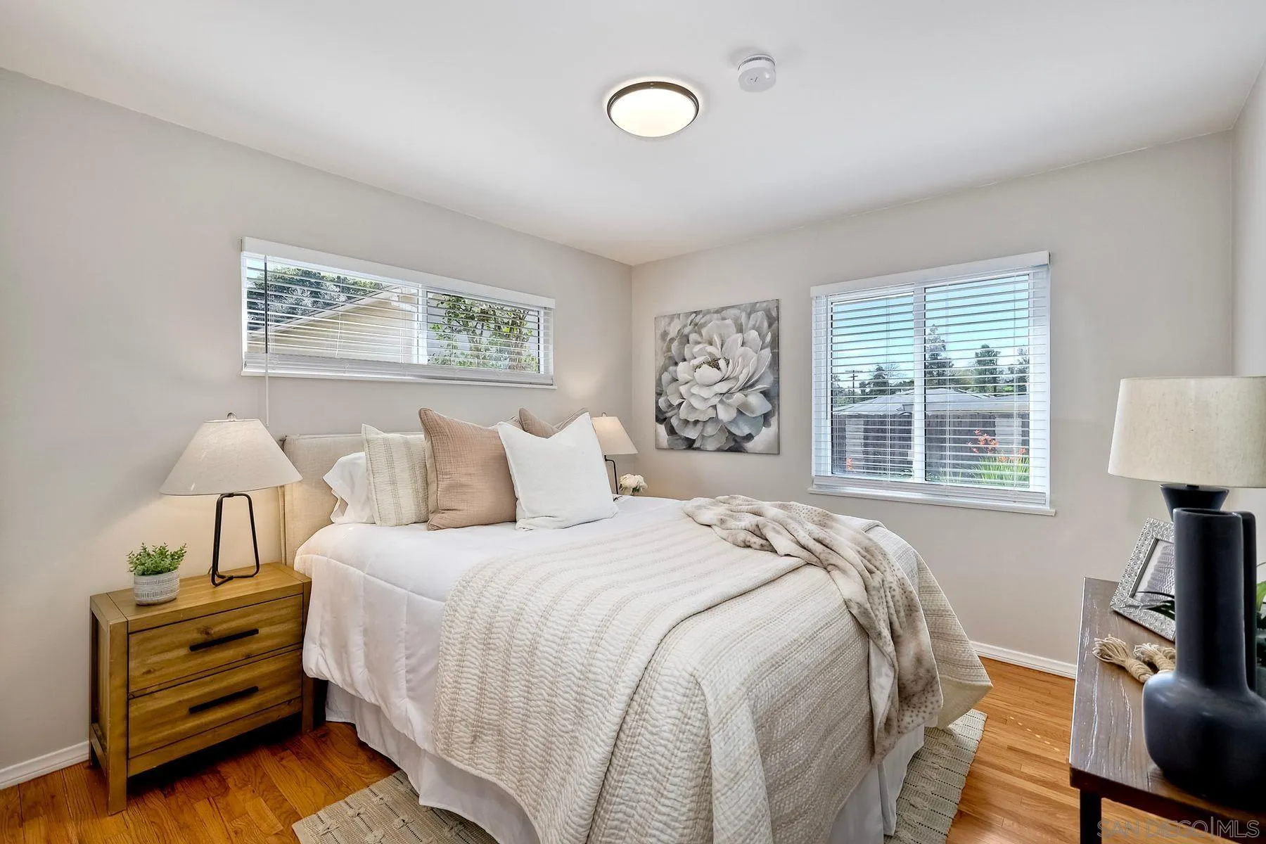 9307 Manor Drive La Mesa, CA 91942 - Photo 18 of 29 a bedroom with bed and a window