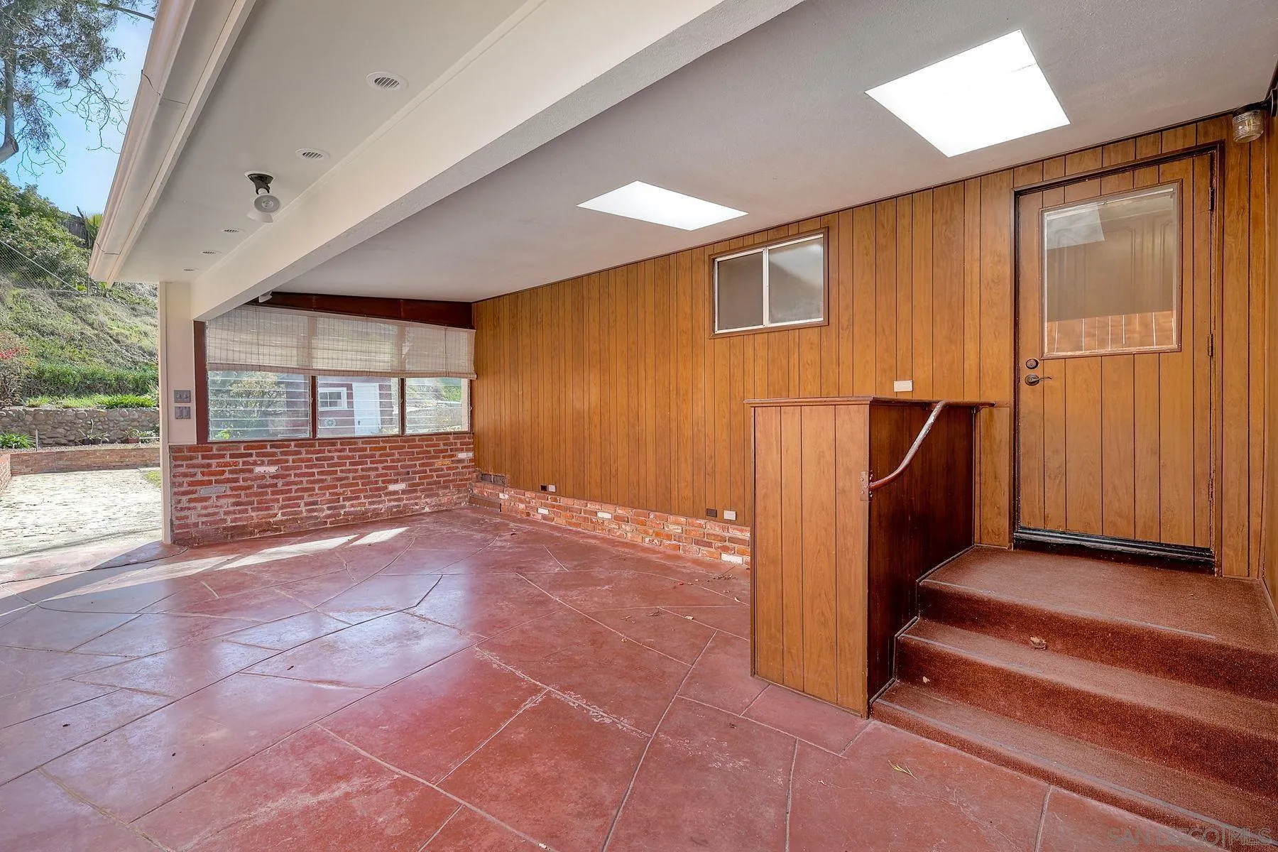 9307 Manor Drive La Mesa, CA 91942 - Photo 21 of 29 a view of an front door and wooden floor