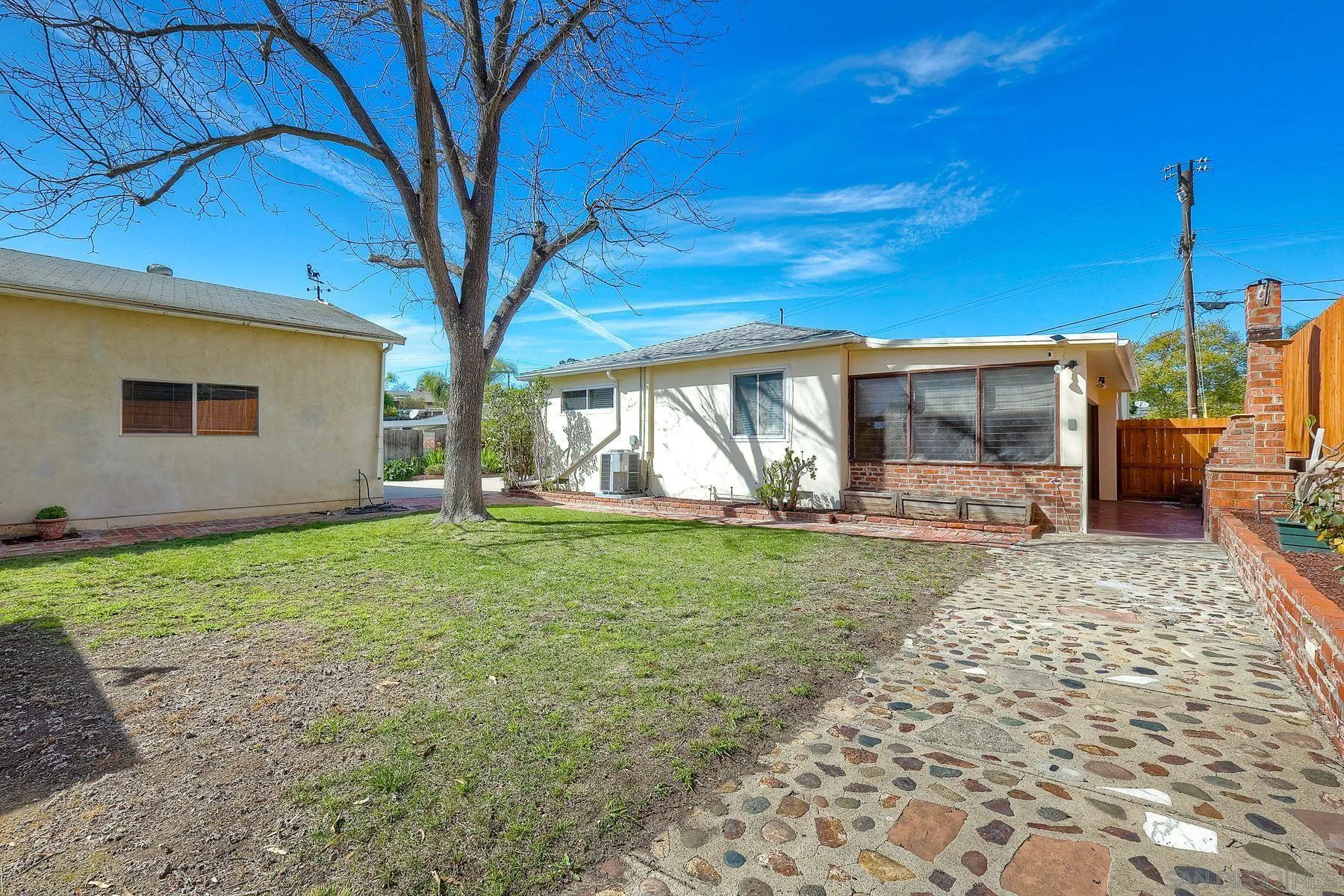 9307 Manor Drive La Mesa, CA 91942 - Photo 24 of 29 a view of a house with backyard