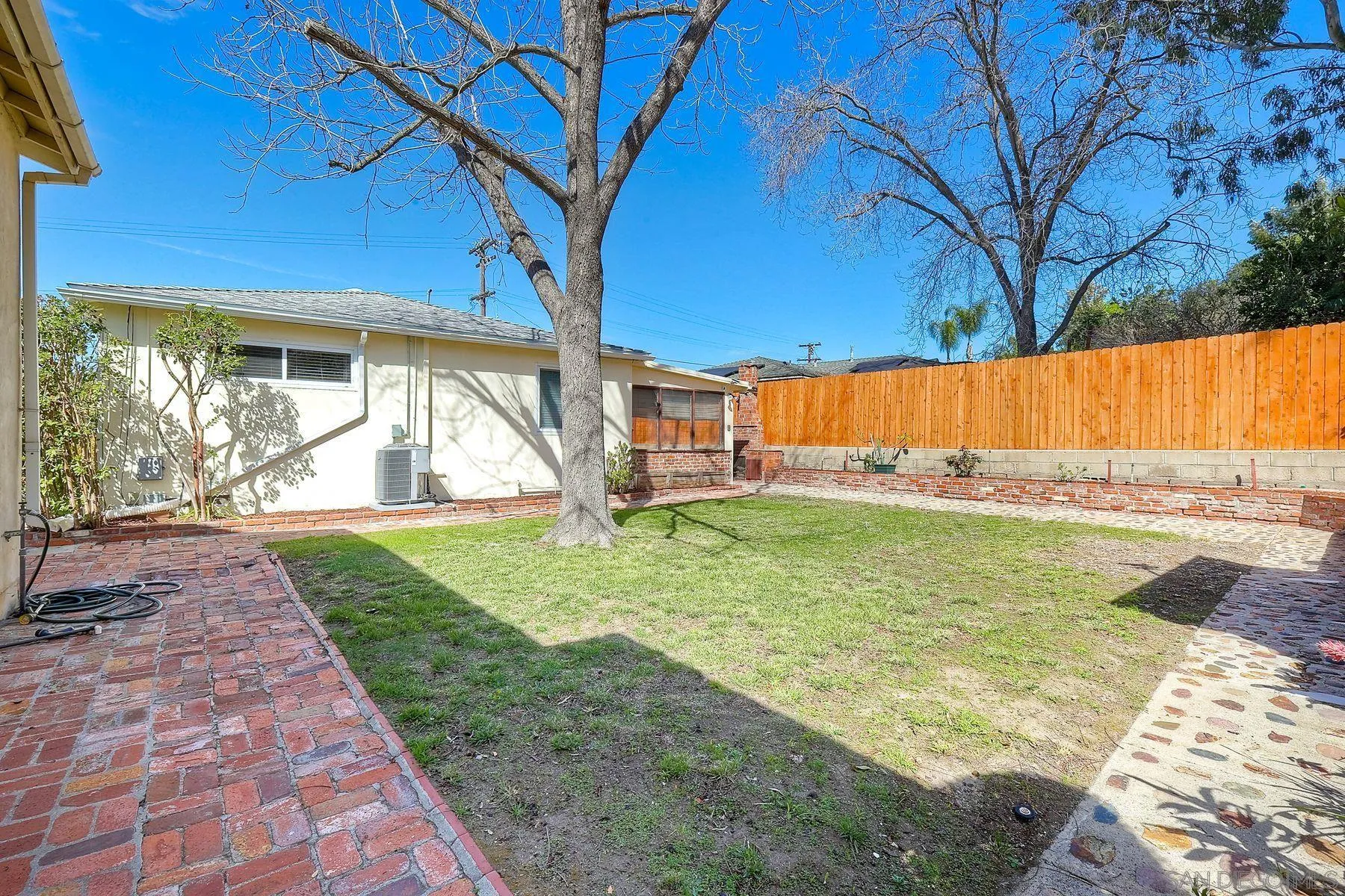 9307 Manor Drive La Mesa, CA 91942 - Photo 25 of 29 a view of a backyard with a small cabin