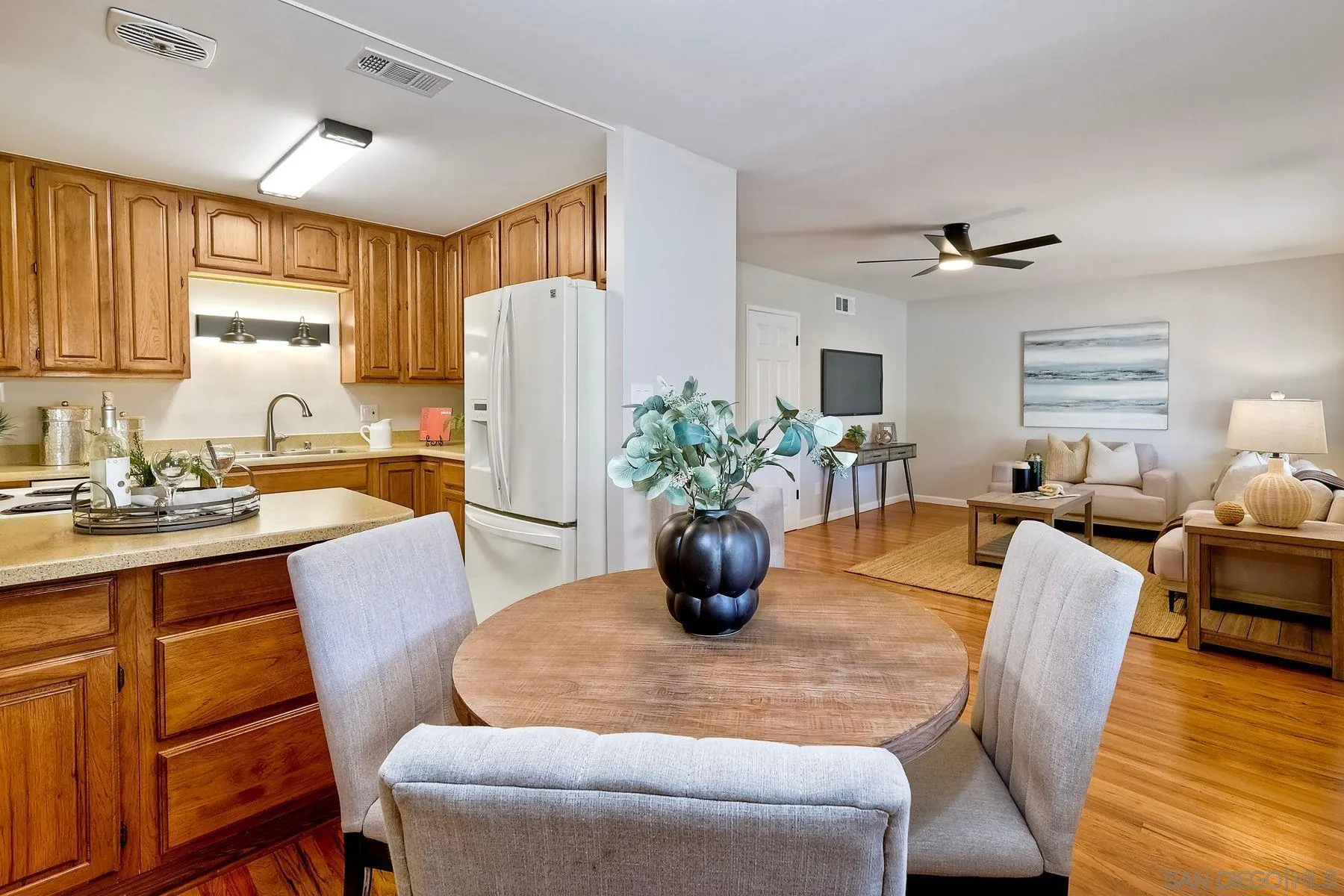 9307 Manor Drive La Mesa, CA 91942 - Photo 8 of 29 a dining room with furniture and wooden floor