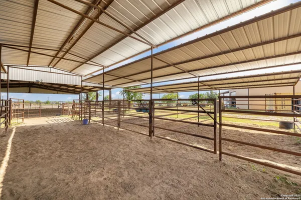 a big yard with table and chairs