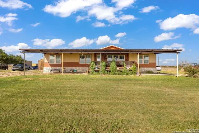 a view of a dining area with furniture window and wooden floor