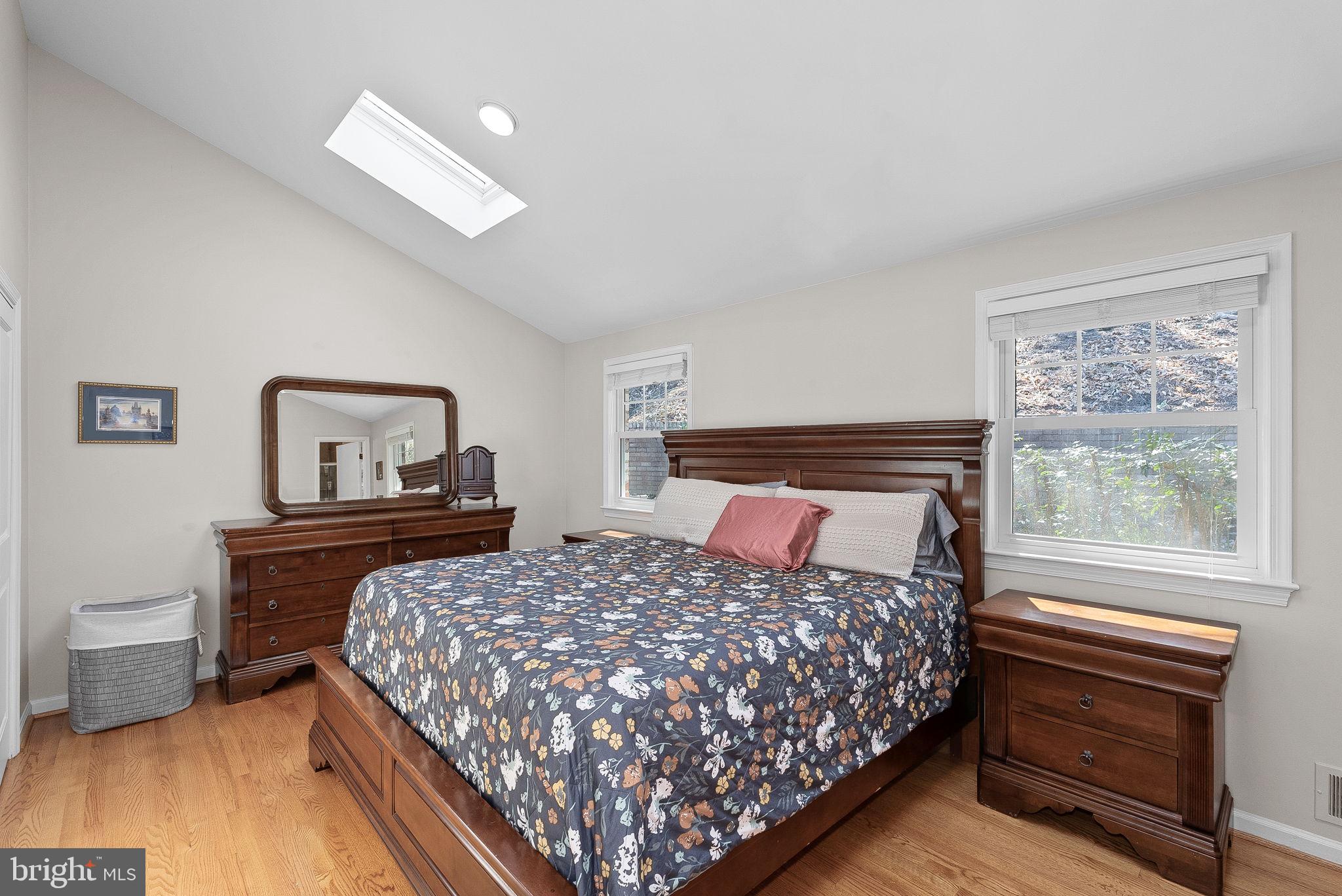 4119 27th Road North Arlington, VA 22207 - Photo 20 of 53 a bedroom with a bed and a dresser next to a window