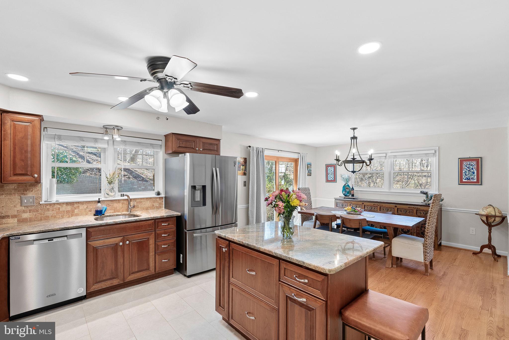 4119 27th Road North Arlington, VA 22207 - Photo 2 of 53 a kitchen with stainless steel appliances granite countertop a sink stove and refrigerator