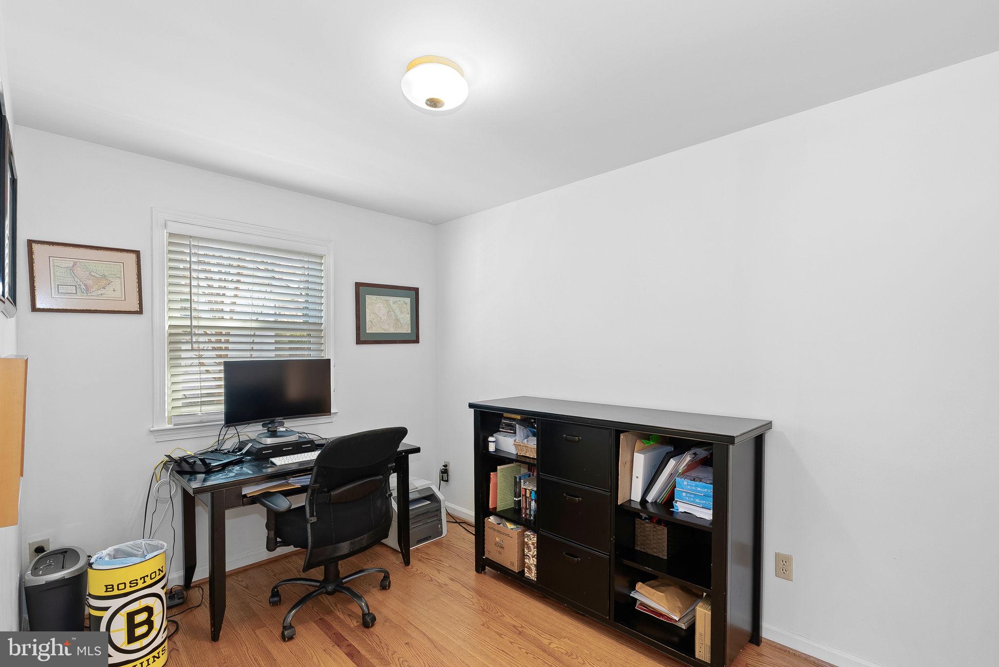 4119 27th Road North Arlington, VA 22207 - Photo 26 of 53 a view of a workspace with furniture and a window