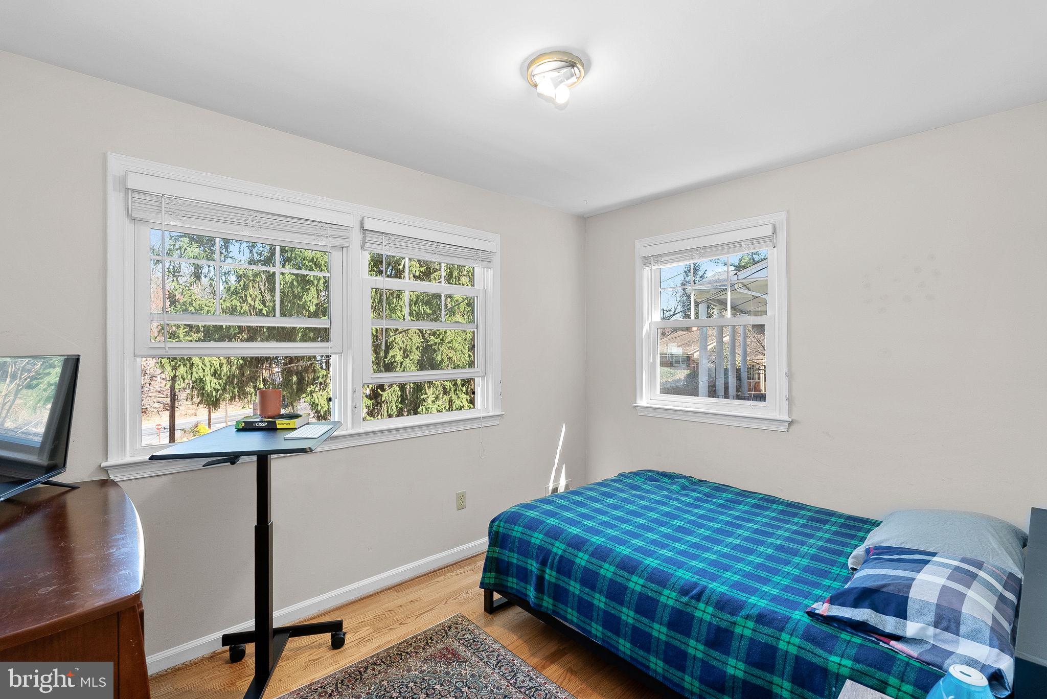4119 27th Road North Arlington, VA 22207 - Photo 27 of 53 a bedroom with a bed and a window