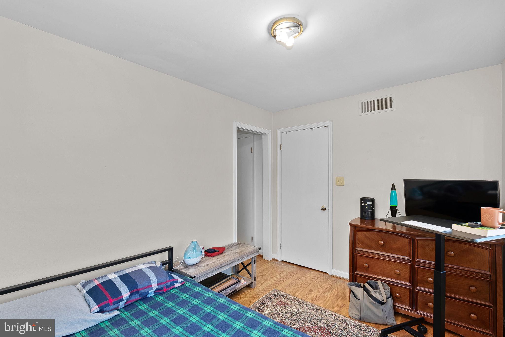 4119 27th Road North Arlington, VA 22207 - Photo 28 of 53 a living room with furniture and a flat screen tv