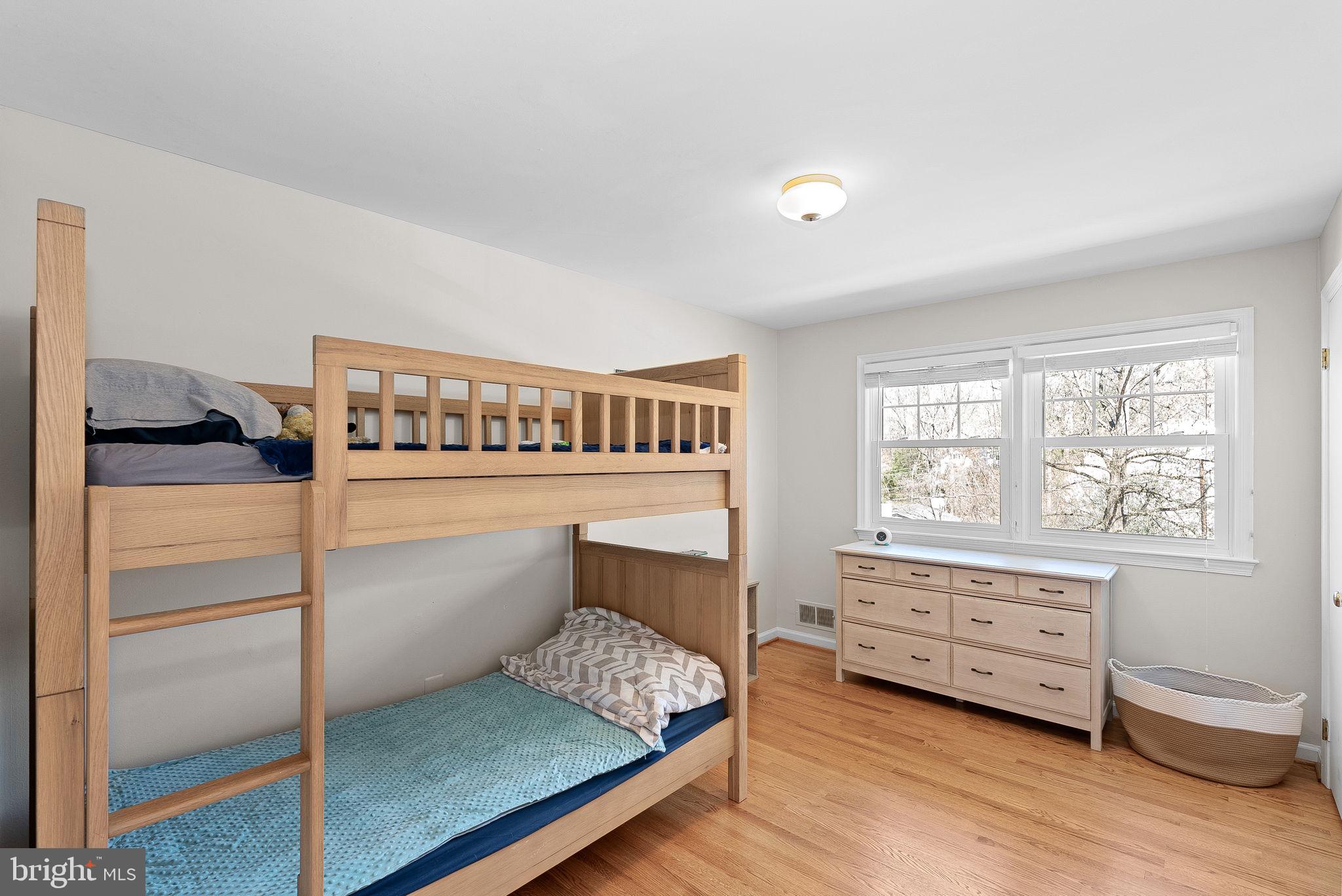 4119 27th Road North Arlington, VA 22207 - Photo 29 of 53 a bedroom with a bed and a window