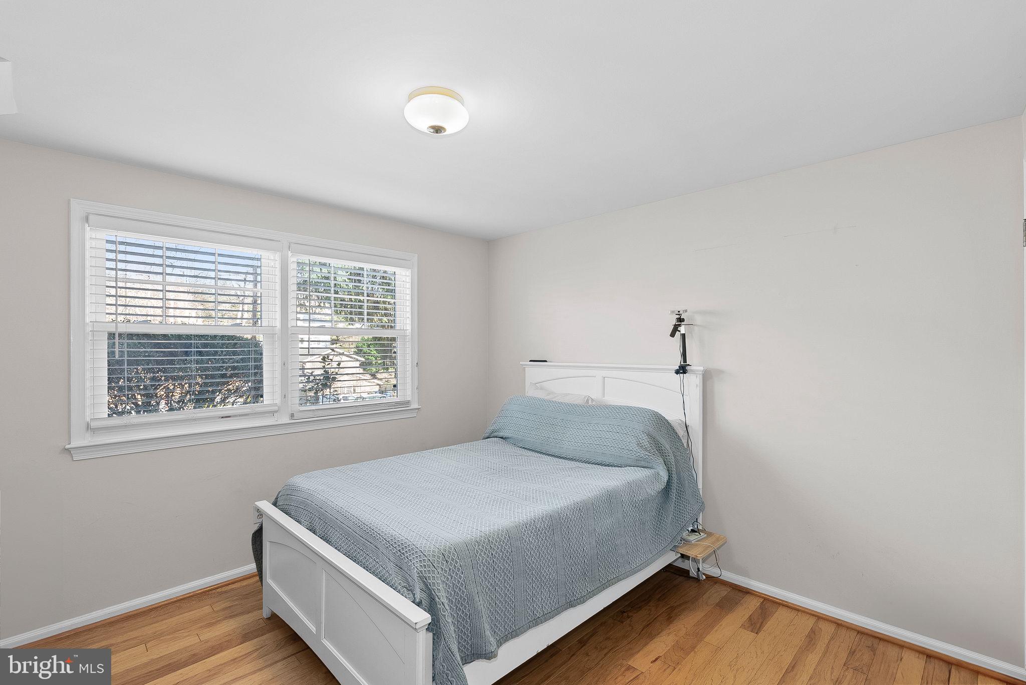 4119 27th Road North Arlington, VA 22207 - Photo 39 of 53 a bedroom with a bed and a window