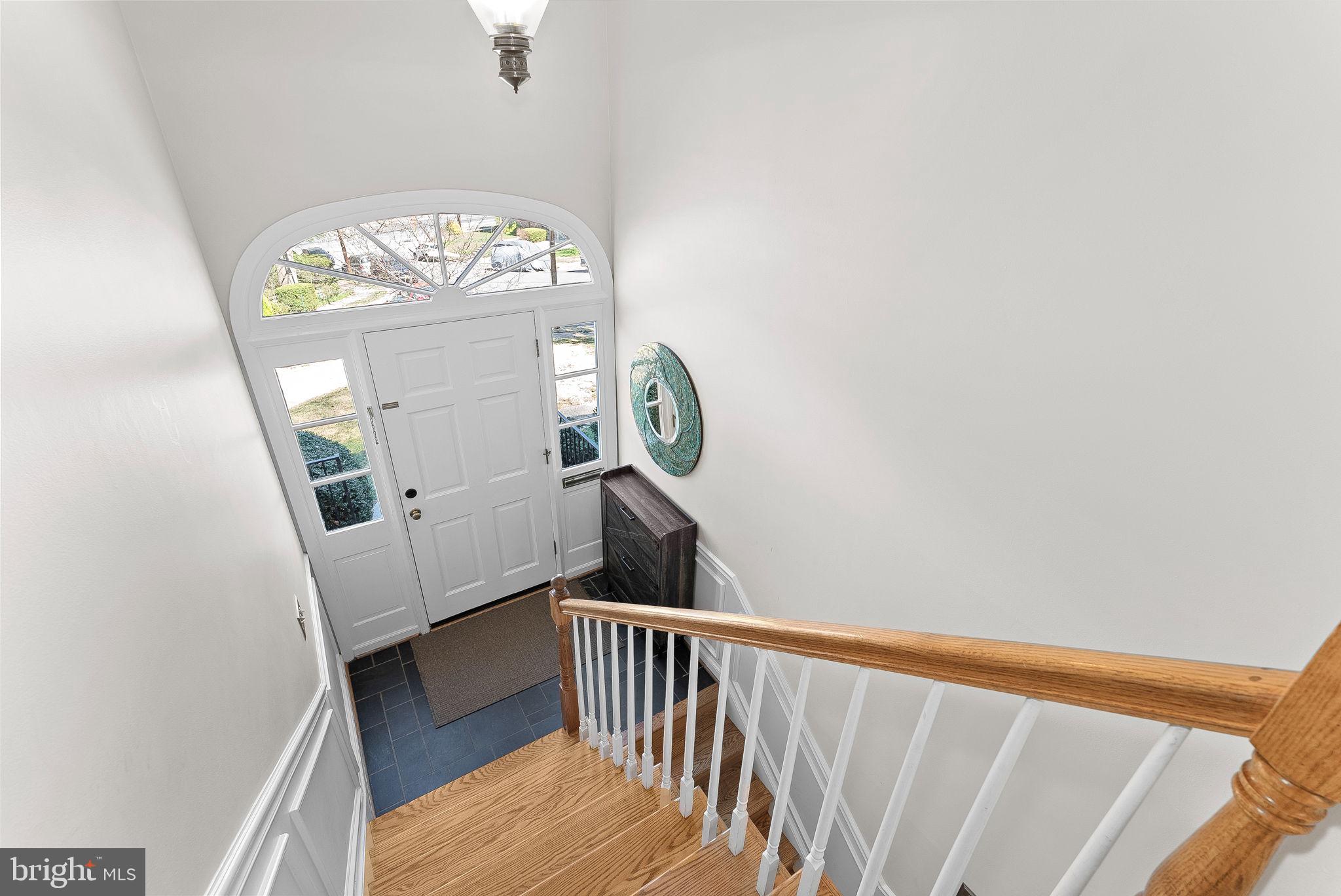 4119 27th Road North Arlington, VA 22207 - Photo 50 of 53 a view of a hallway with wooden floor and a window
