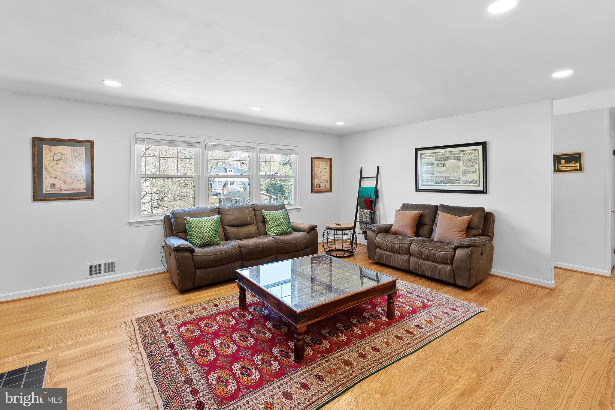 4119 27th Road North Arlington, VA 22207 - Photo 5 of 53 a living room with furniture a rug and a window