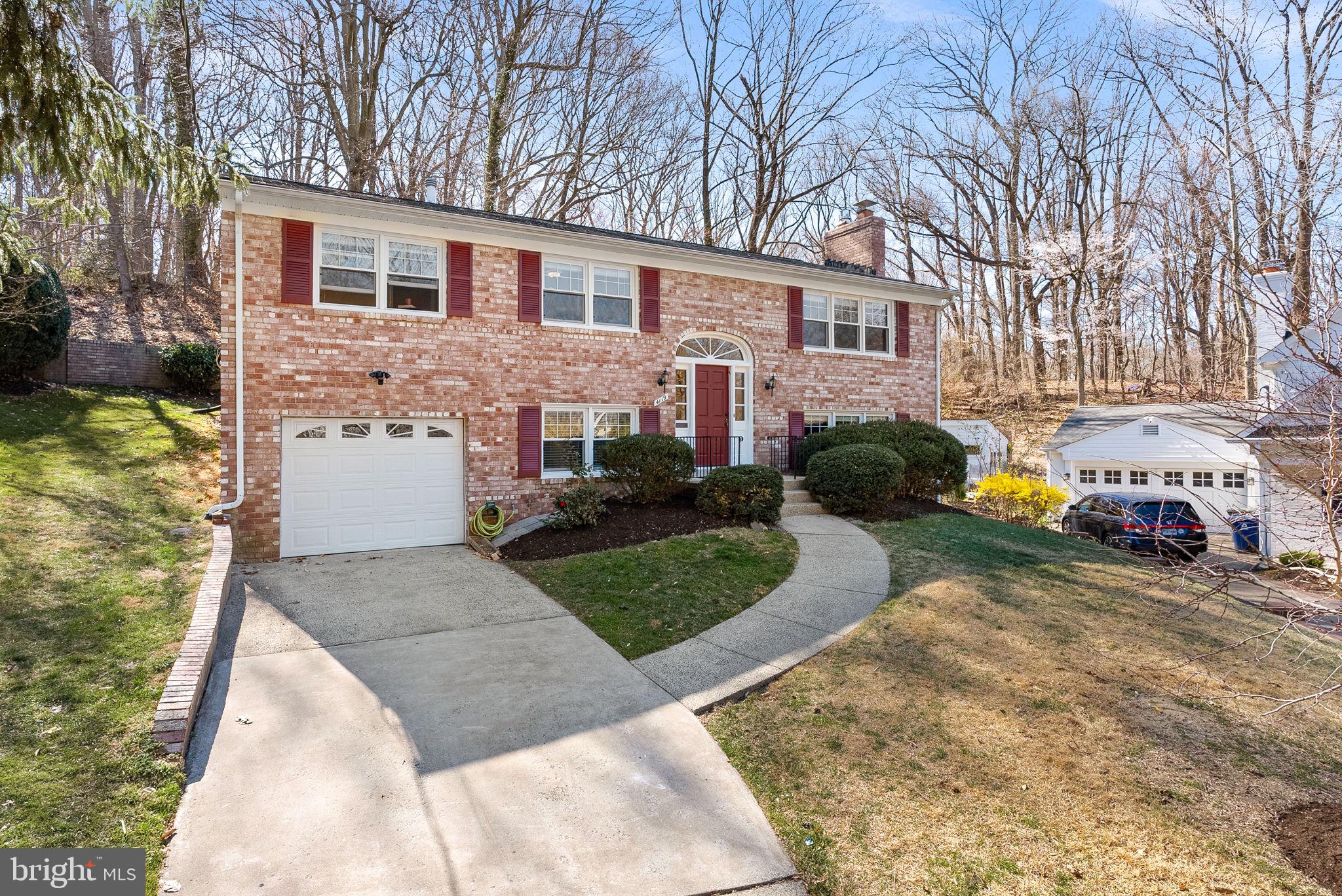 4119 27th Road North Arlington, VA 22207 - Photo 51 of 53 a front view of a house with a yard and outdoor seating