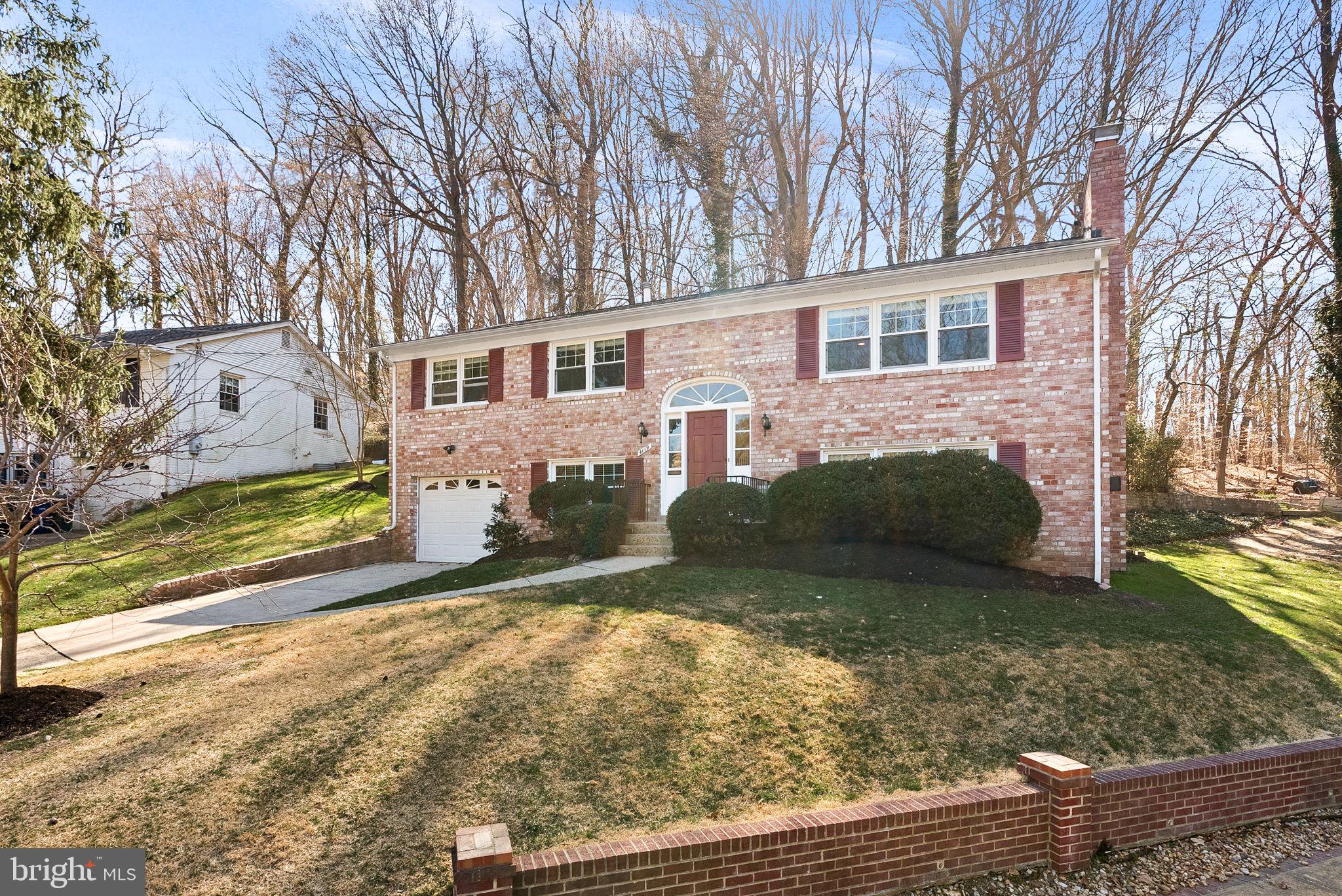 4119 27th Road North Arlington, VA 22207 - Photo 52 of 53 a view of a yard in front of a house with large trees