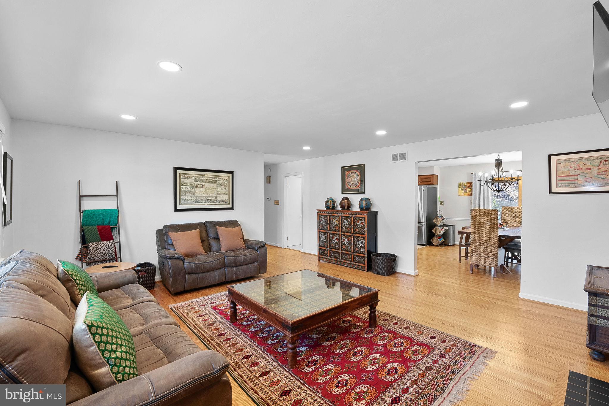 4119 27th Road North Arlington, VA 22207 - Photo 6 of 53 a living room with furniture and wooden floor