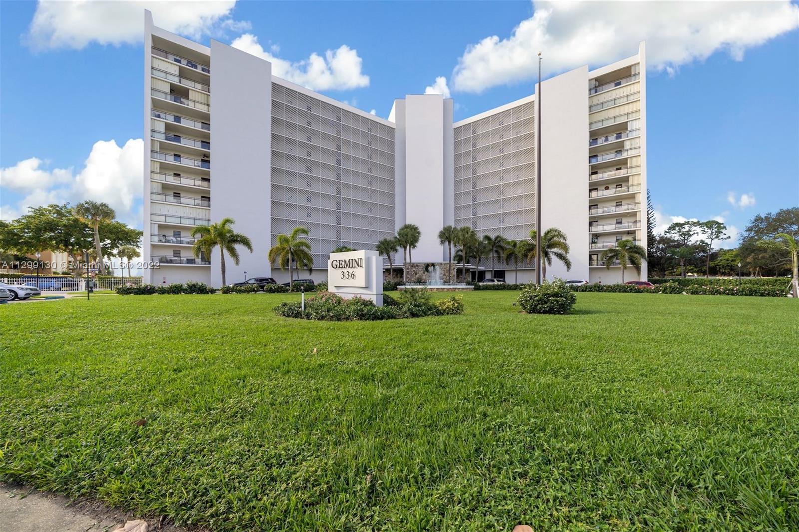 336 Golfview Road, Unit 502 North Palm Beach, FL 33408 - Photo 1 of 7 a front view of a building with outdoor seating