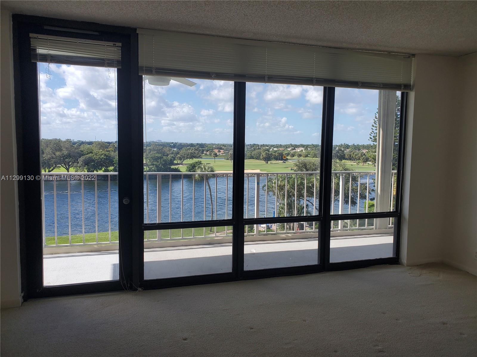336 Golfview Road, Unit 502 North Palm Beach, FL 33408 - Photo 3 of 7 a view of an empty room and window