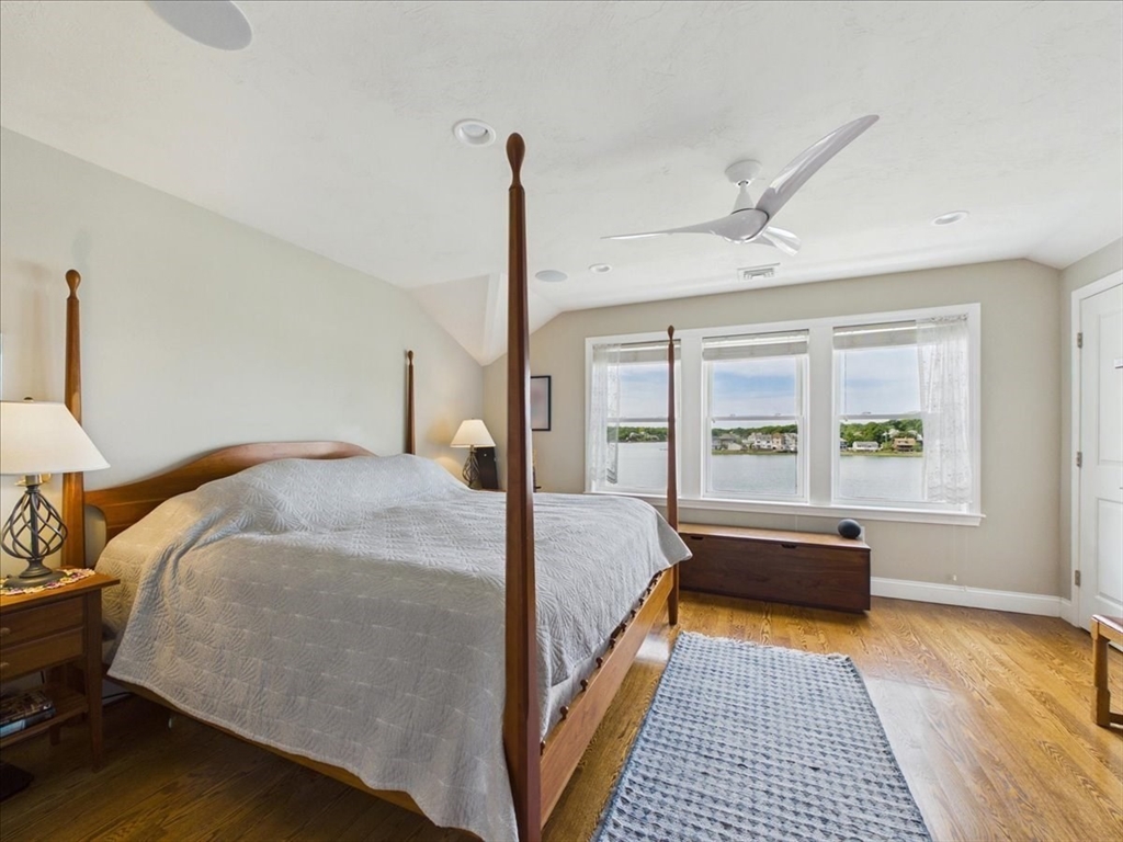 7 Bay Street, Unit 3 Hull, MA 02045 - Photo 24 of 40 a bed room with a bed and a window