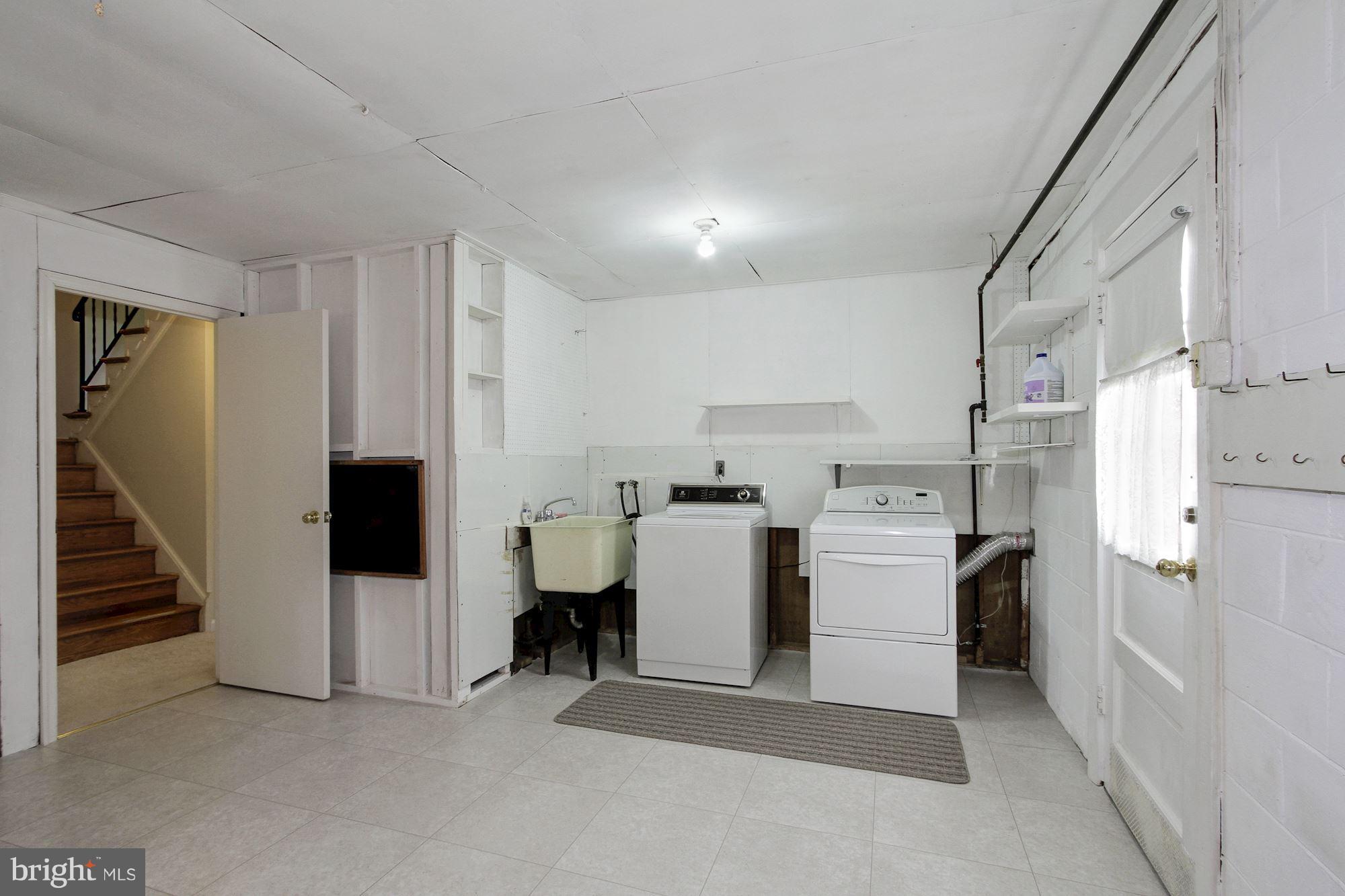 11320 Gainsborough Road Potomac, MD 20854 - Photo 20 of 23 Laundry & Utility Room with exit to side