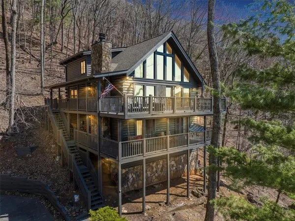 a front view of a house with parking area