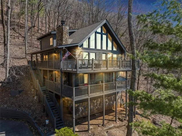 a front view of a house with parking area