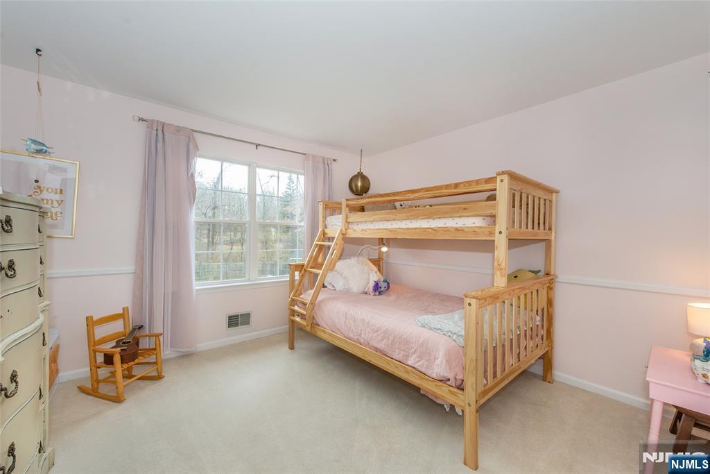 301 Cokesbury High Bridge Road Lebanon, NJ 08833 - Photo 13 of 31 a bedroom with a bed and a window