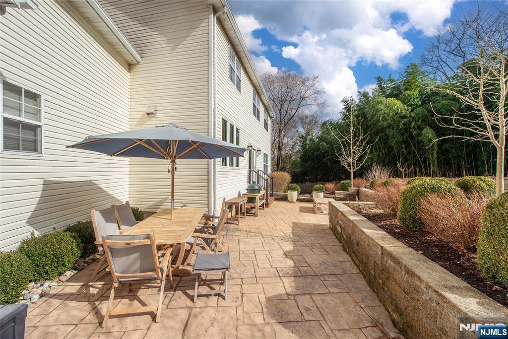 301 Cokesbury High Bridge Road Lebanon, NJ 08833 - Photo 24 of 31 a view of a patio with couches table and chairs and potted plants