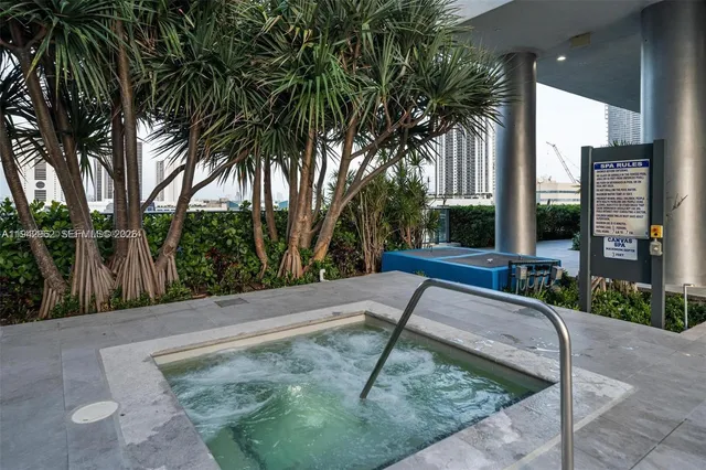 a view of a backyard with palm trees