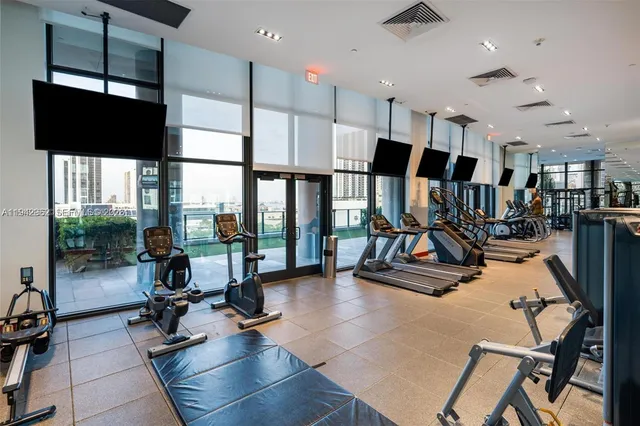 a view of a room with gym equipment