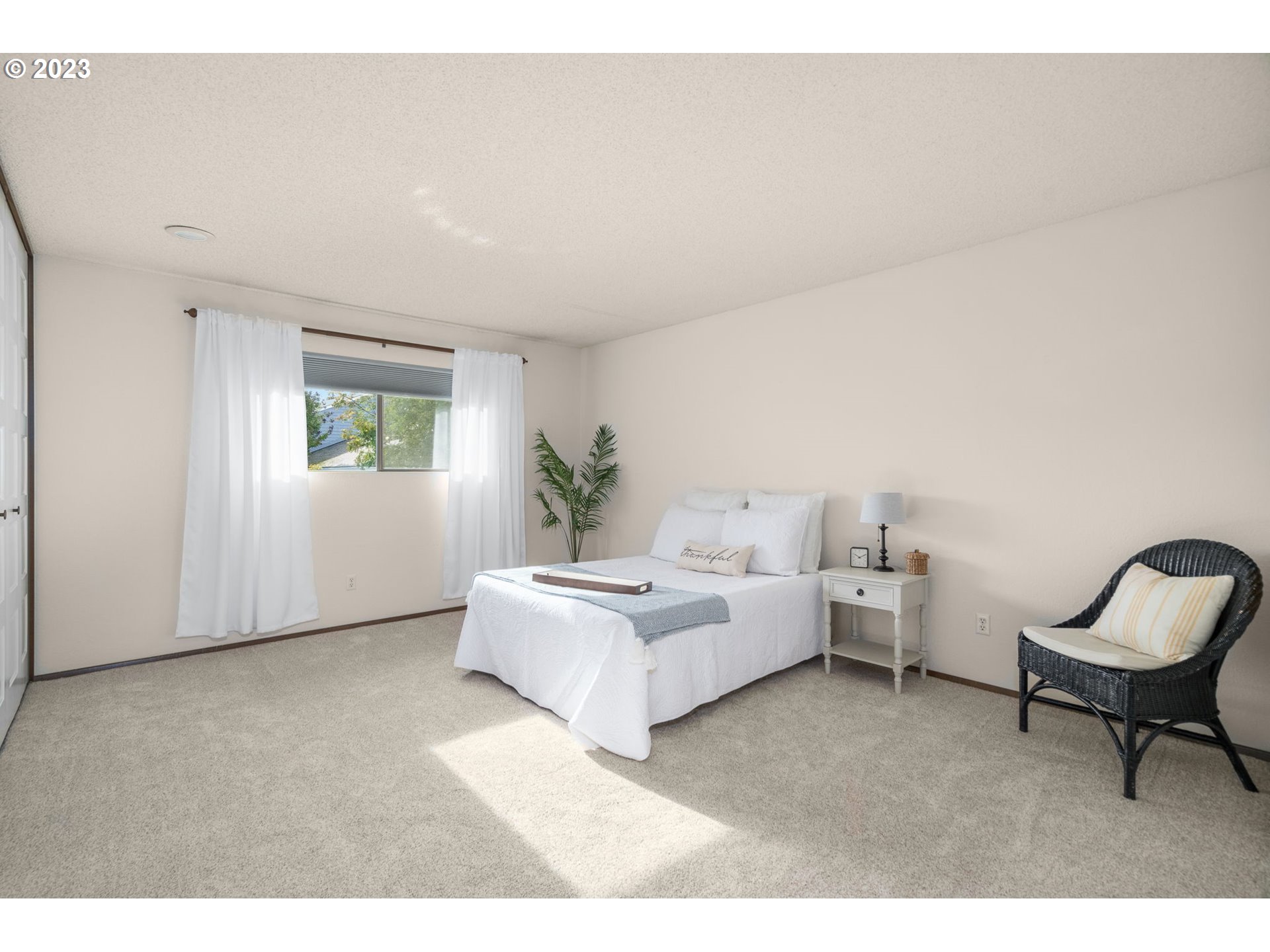 15735 Southwest Highland Court Portland, OR 97224 - Photo 20 of 39 a living room with furniture and a window