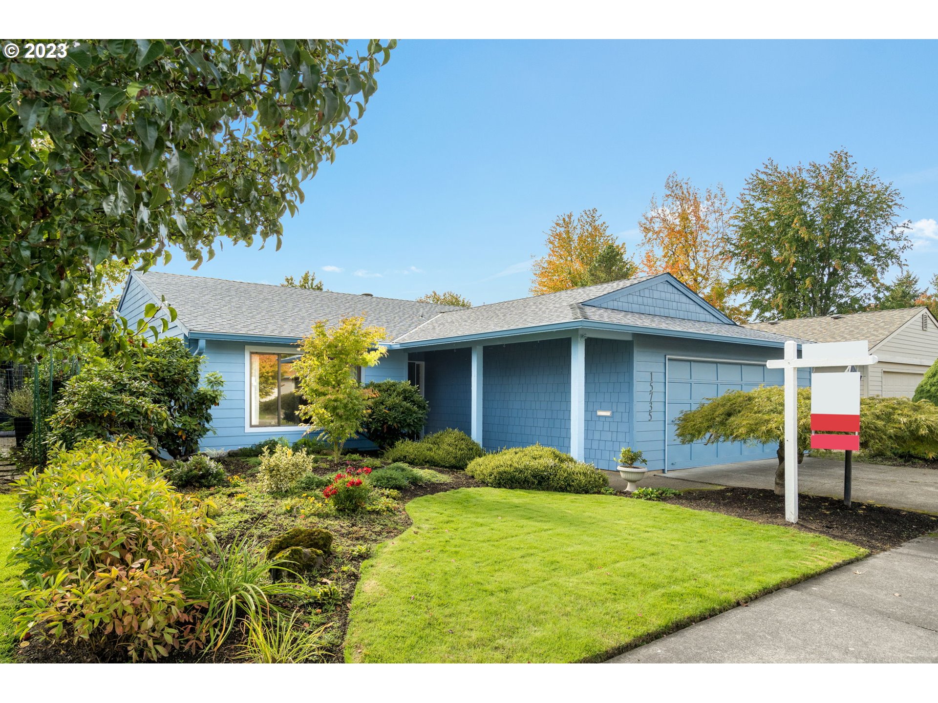 15735 Southwest Highland Court Portland, OR 97224 - Photo 2 of 39 a view of a house with a yard