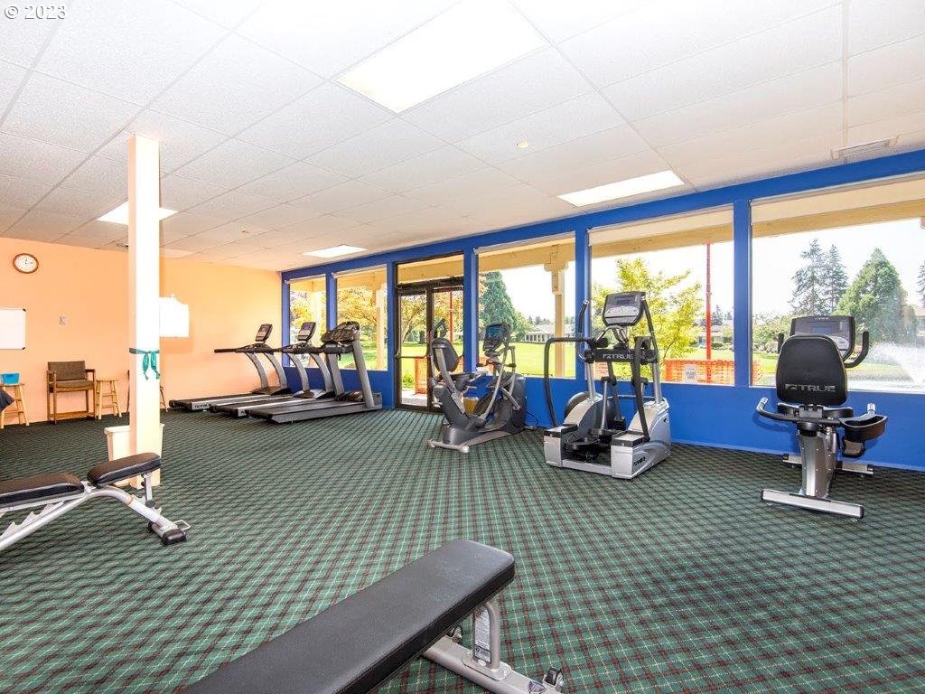 15735 Southwest Highland Court Portland, OR 97224 - Photo 34 of 39 a living room filled with furniture