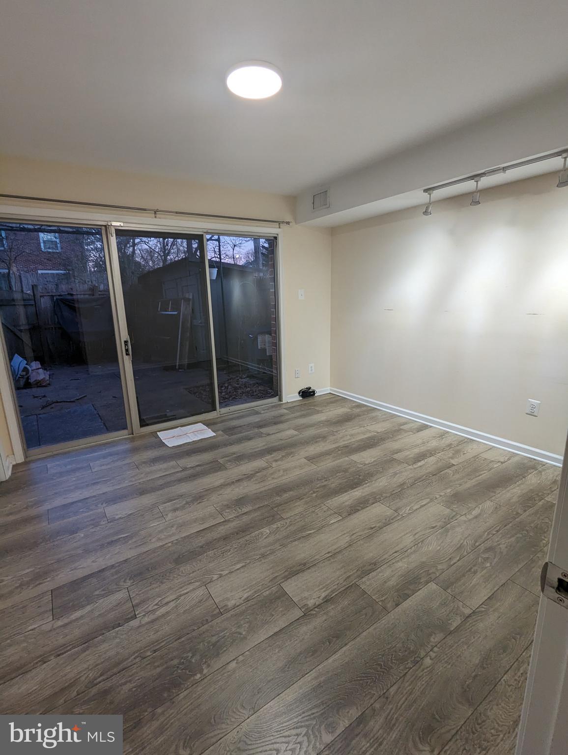5845 Rexford Drive, Unit 721 Springfield, VA 22152 - Photo 22 of 28 sliding doors to patio